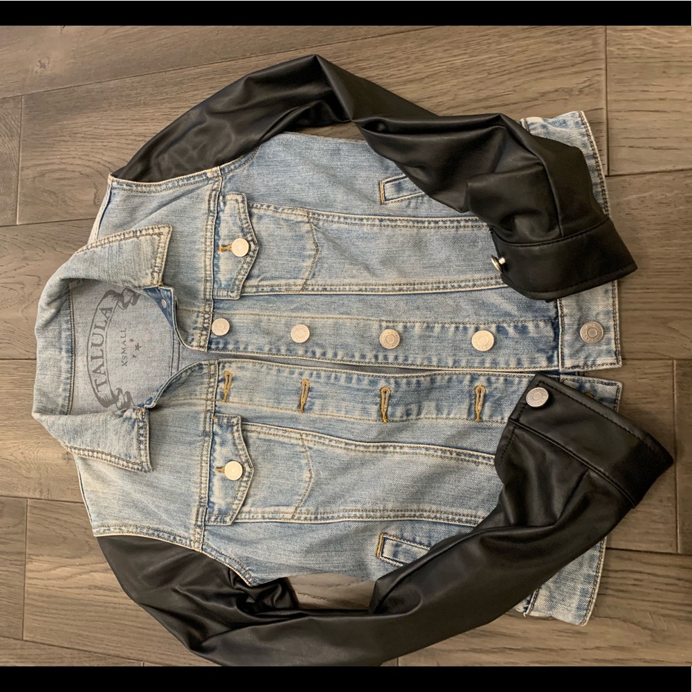 Women’s jean jacket with leather sleeves